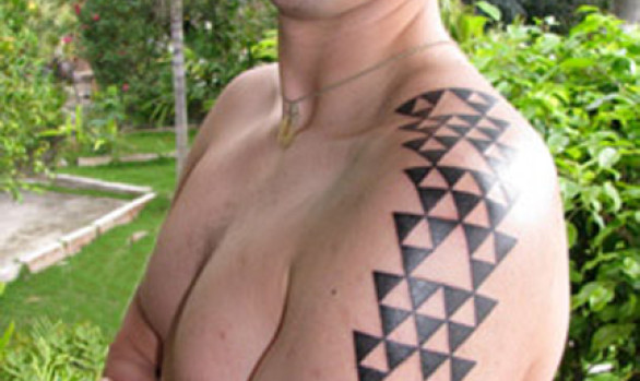 Jeremy wears a traditional Hawaiian pattern symbolic of lauhala, which often has deeper levels of meaning.