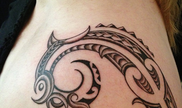 Jessica's shoulder is done in a Maori/Samoan influenced style.