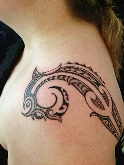 Jessica's shoulder is done in a Maori/Samoan influenced style.