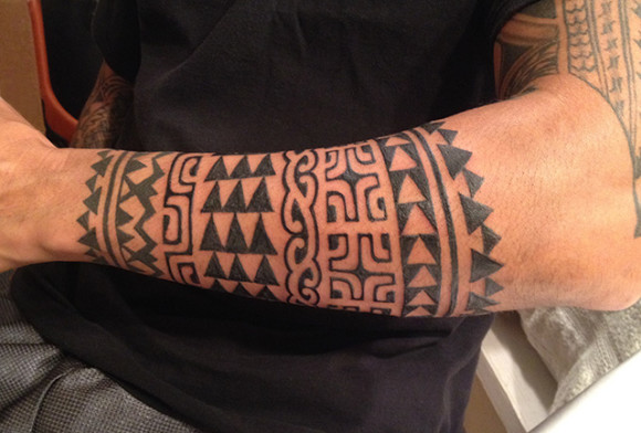 Kaleo's forearm is comprised of a myriad of Pacific patterns.