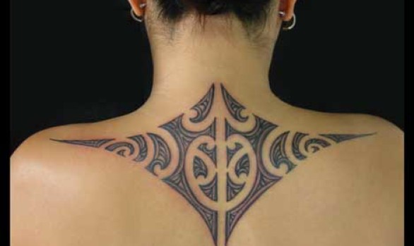 Marcy wears a design inspired by traditional Maori patterns.