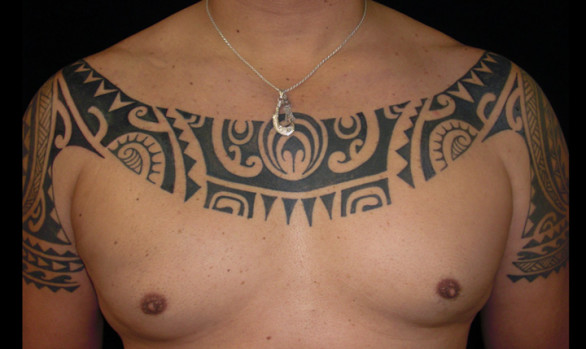 Ray's chest was inspired by both modern and traditional Marquesan tattoo designs.
